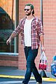 liam hemsworth picks up beer with his buddy in australia 05