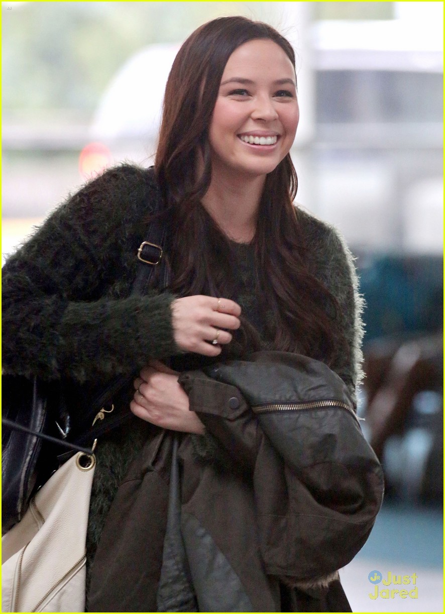 malese jow exits vancouver for holidays 01