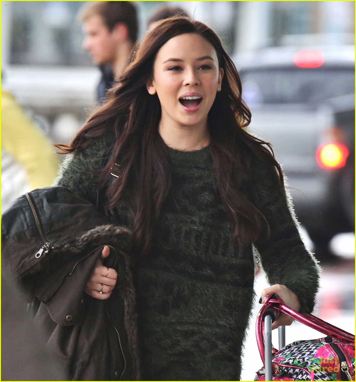 malese jow exits vancouver for holidays 04