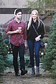 veronica dunne max ehrich cute christmas tree couple 01