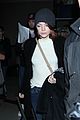 emma stone lands in los angeles before 2015 golden globes 02