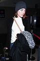 emma stone lands in los angeles before 2015 golden globes 04