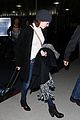 emma stone lands in los angeles before 2015 golden globes 05