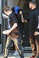 justin bieber covers hair with two cushions after salon visit 14