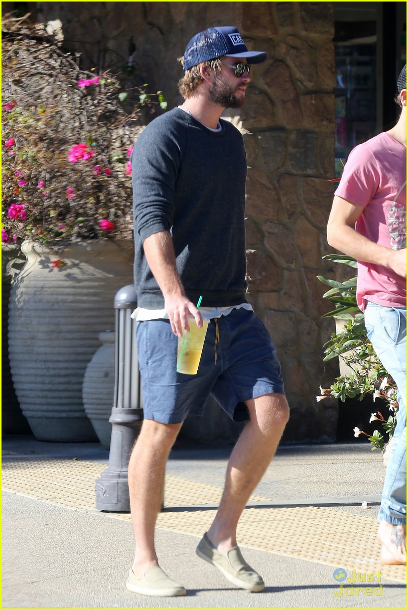 liam hemsworth back in states wrapping dressmaker 01