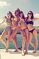 taylor swift reveals her belly button in a tiny bikini 02