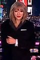 taylor swift warms up with ryan seacrests coat on new years eve 04