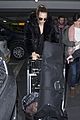 cara delevingne heads back to london after harry styles bday 08