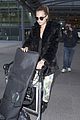 cara delevingne heads back to london after harry styles bday 11