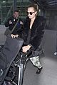 cara delevingne heads back to london after harry styles bday 12