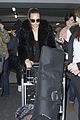 cara delevingne heads back to london after harry styles bday 14