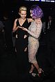 miley cyrus cups katy perrys boob at grammys 2015 01