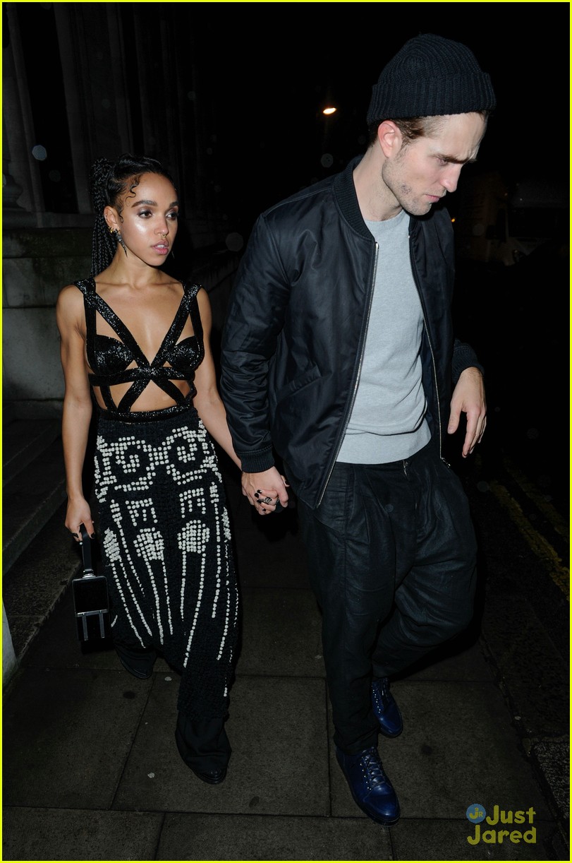 robert pattinson fka twigs hold hands at brit awards party 07