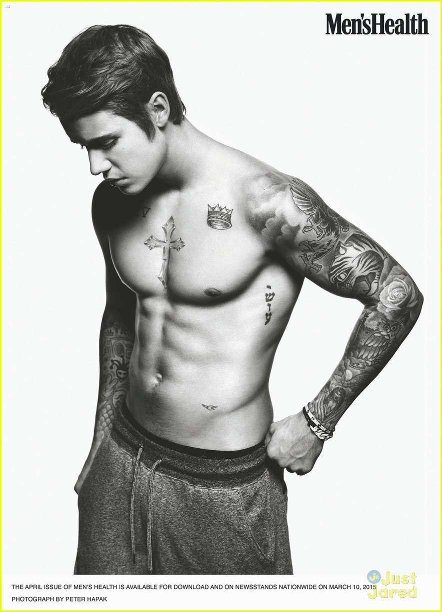 justin bieber goes shirtless for mens health 01