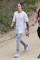 justin bieber covers his face with a pillow again 09