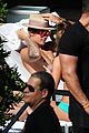 justin bieber relaxes poolside after mens health story 01