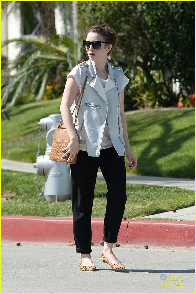 lily collins see true magic on the sidewalk 03