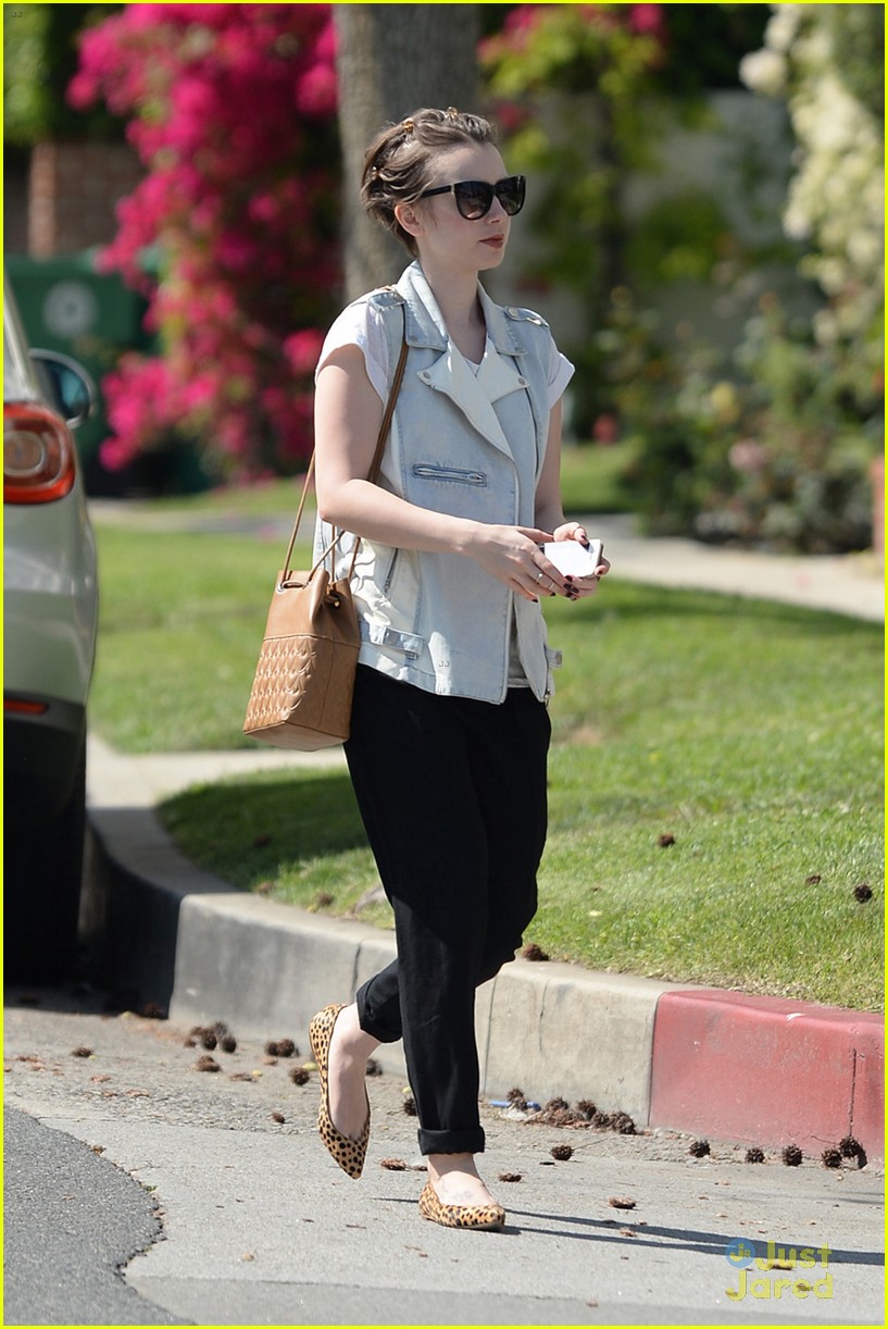 lily collins see true magic on the sidewalk 20
