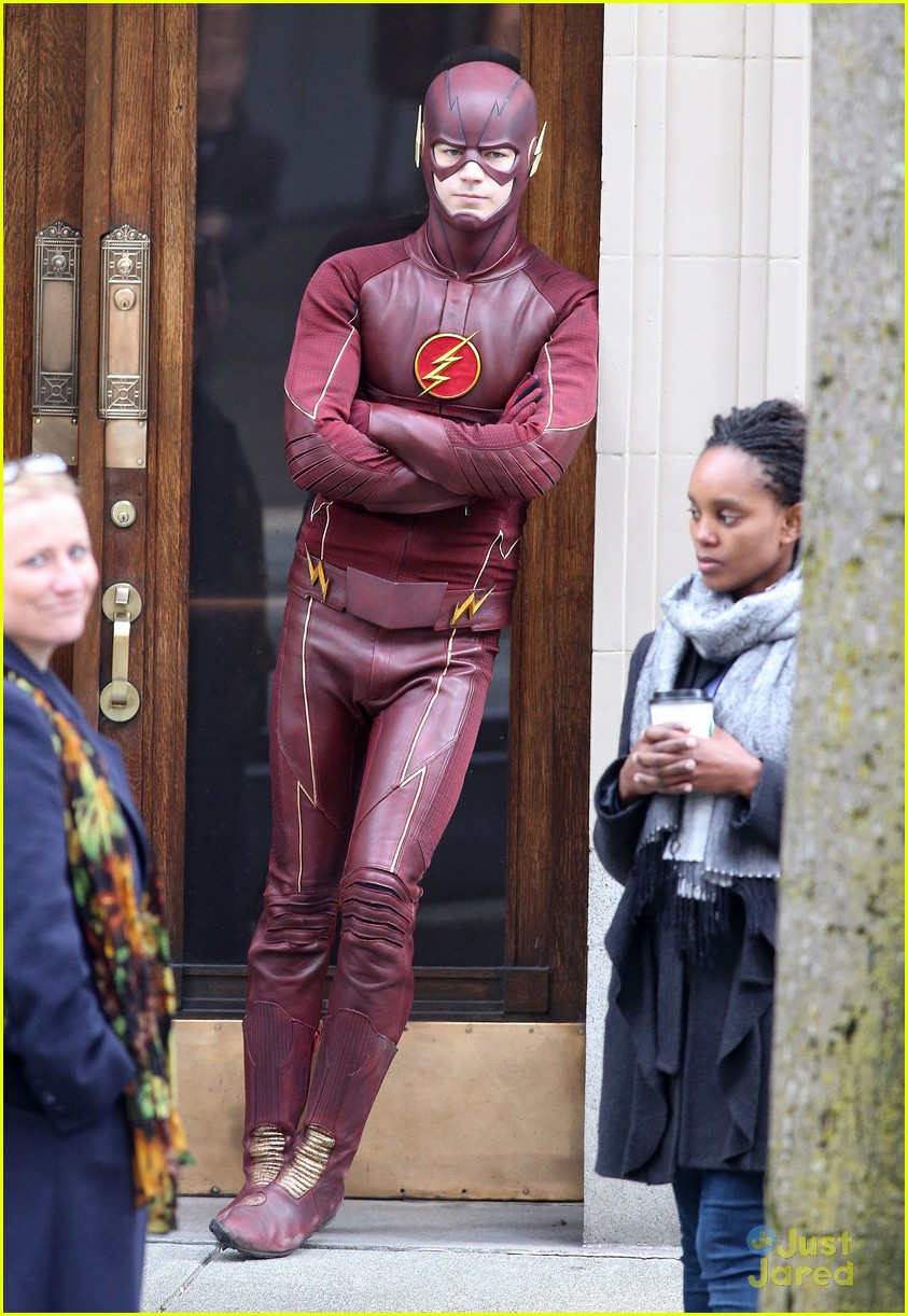 grant gustin gives out bunny ears on the flash set 13