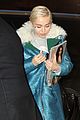 miley cyrus uses selena gomez to hide from photographers 02