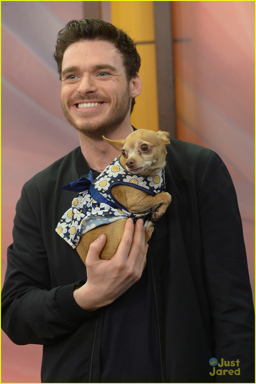 cinderellas richard madden charms us with this cute puppy 07
