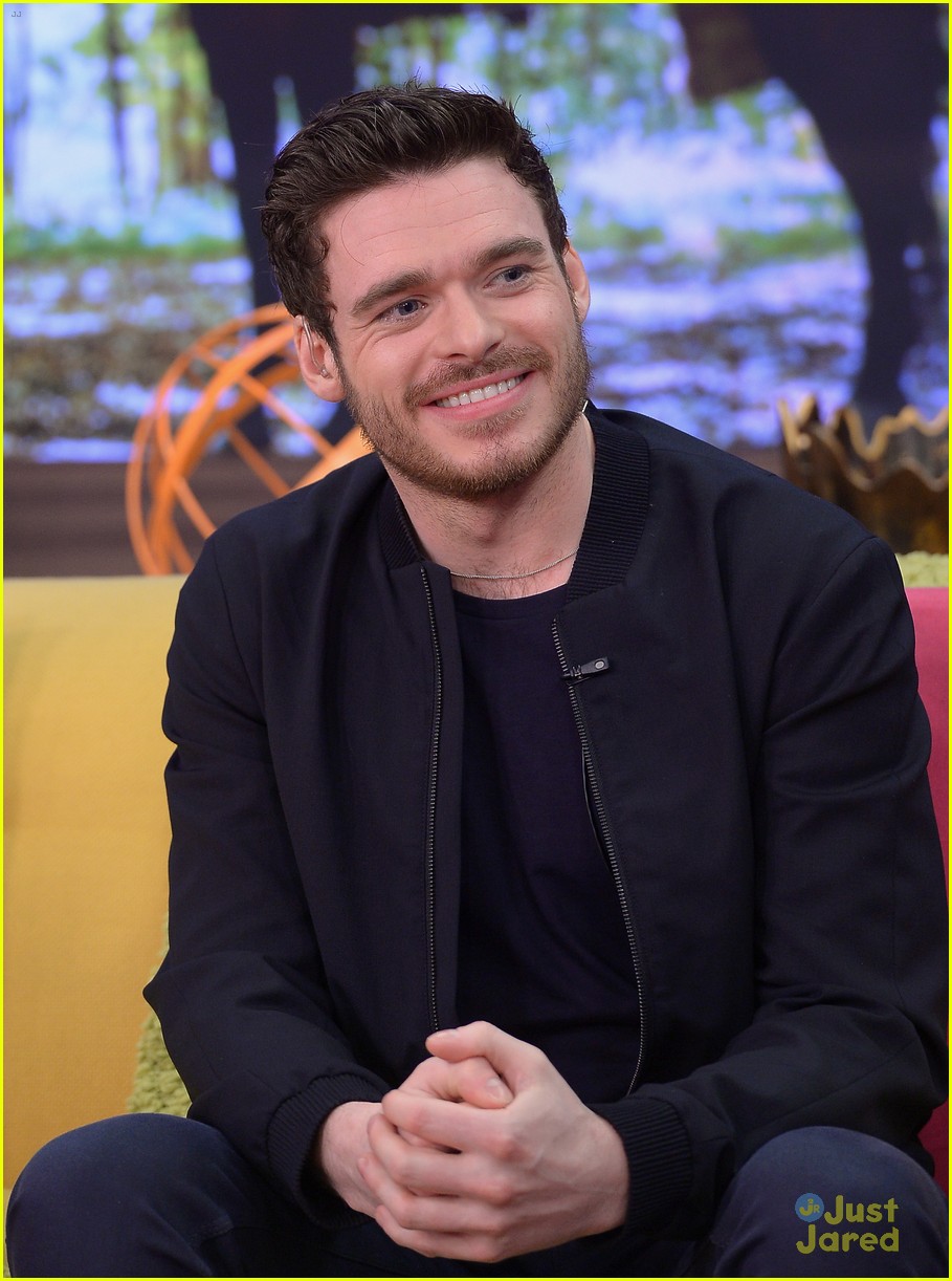 cinderellas richard madden charms us with this cute puppy 17