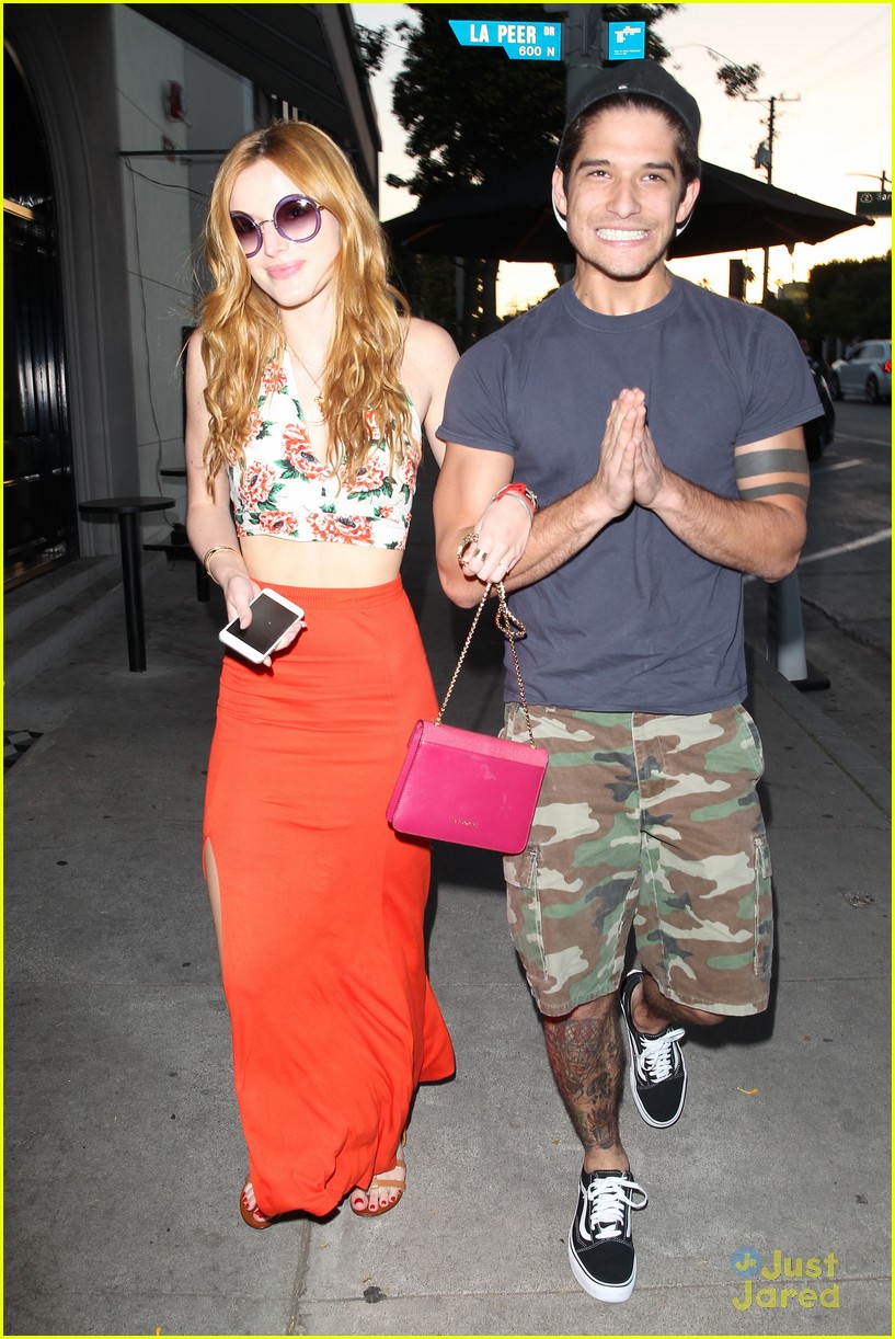 bella thorne tyler posey walk arm in arm together 03