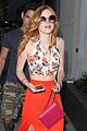 bella thorne tyler posey walk arm in arm together 23