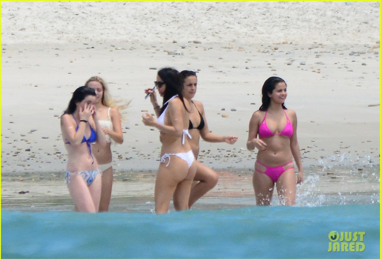 selena gomez shows off her bikini on the beach 16