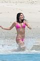 selena gomez shows off her bikini on the beach 01