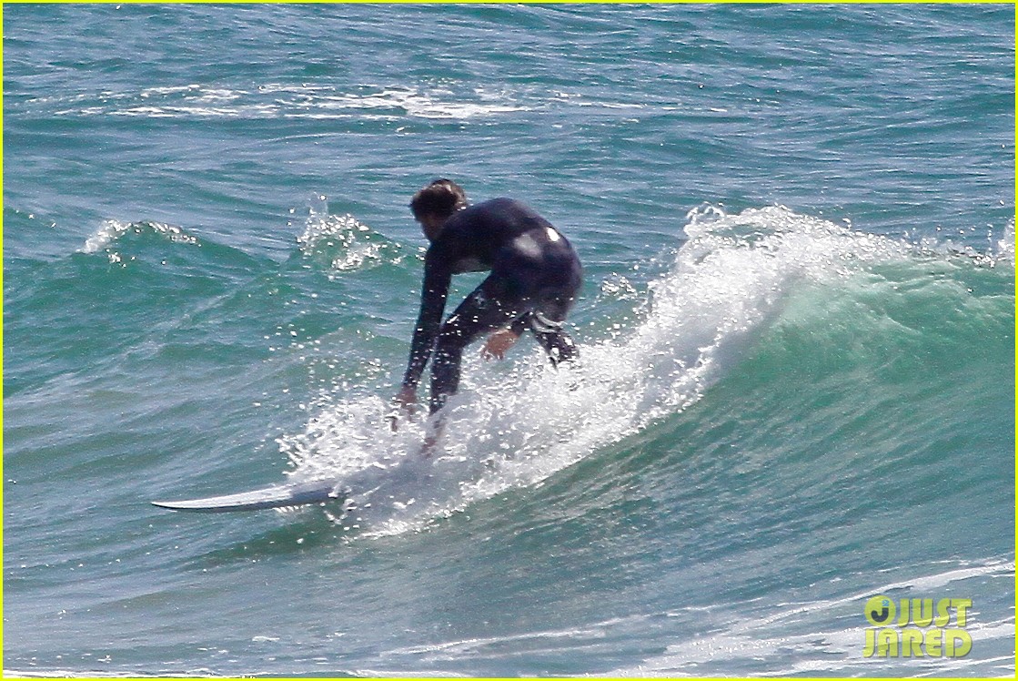 liam hemsworth wetsuit for surfing 12