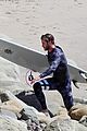 liam hemsworth wetsuit for surfing 11