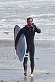 liam hemsworth wetsuit for surfing 13