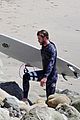 liam hemsworth wetsuit for surfing 14