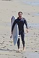 liam hemsworth wetsuit for surfing 17