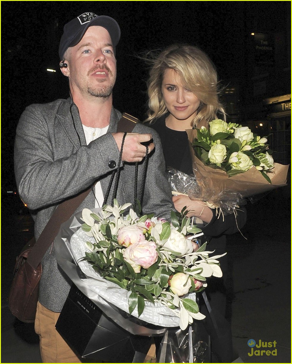 dianna agron gets flowers on mcqueen opening night 02