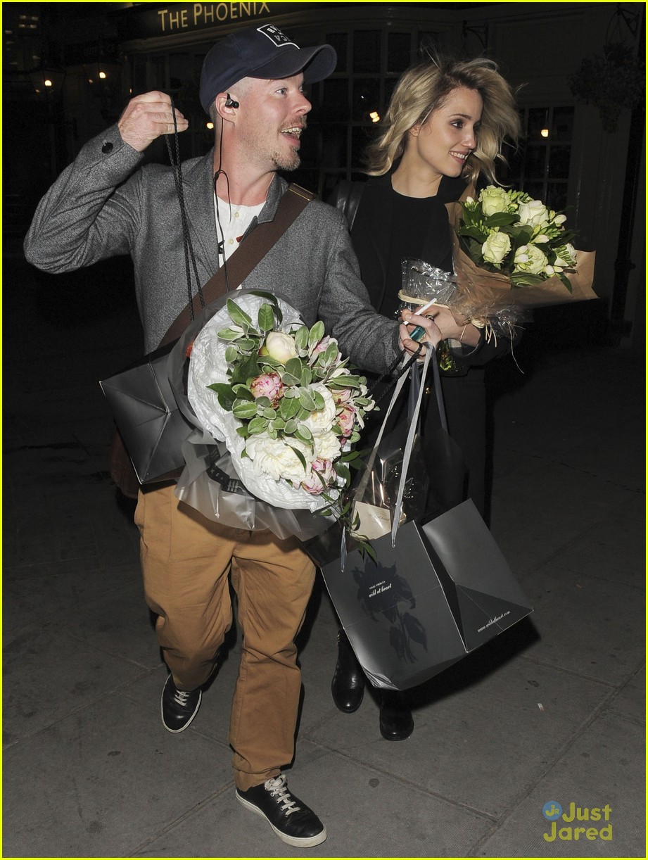 dianna agron gets flowers on mcqueen opening night 07