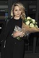 dianna agron gets flowers on mcqueen opening night 04