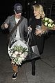 dianna agron gets flowers on mcqueen opening night 06