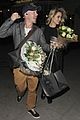 dianna agron gets flowers on mcqueen opening night 07