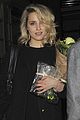 dianna agron gets flowers on mcqueen opening night 08
