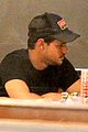 taylor lautner satisfies late night cravings at norms 14