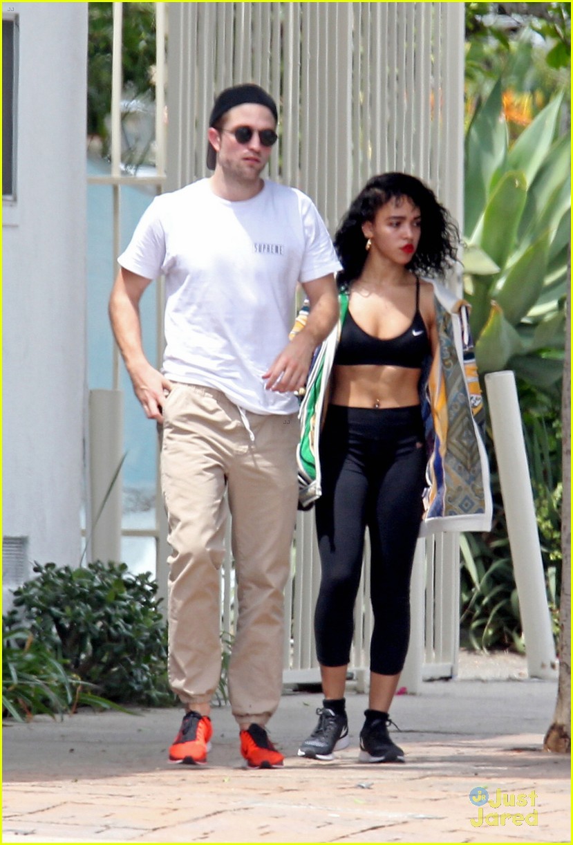 robert pattinson beaming with fka twigs by his side 01