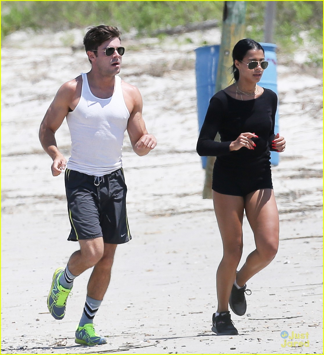 zac efron sami miro work our together on the beach 01