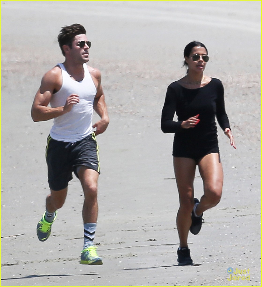 zac efron sami miro work our together on the beach 04
