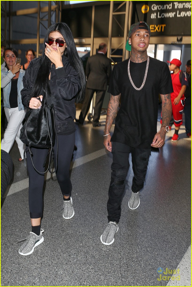 kylie jenner tyga coordinate outfits at lax airport 03