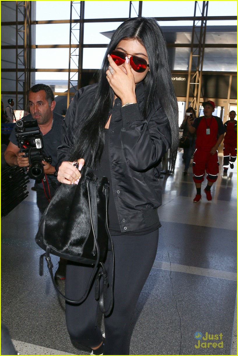 kylie jenner tyga coordinate outfits at lax airport 22
