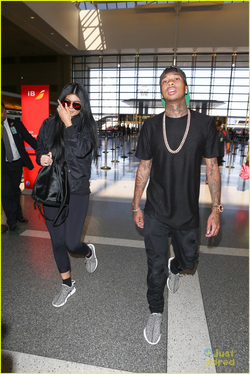 kylie jenner tyga coordinate outfits at lax airport 23