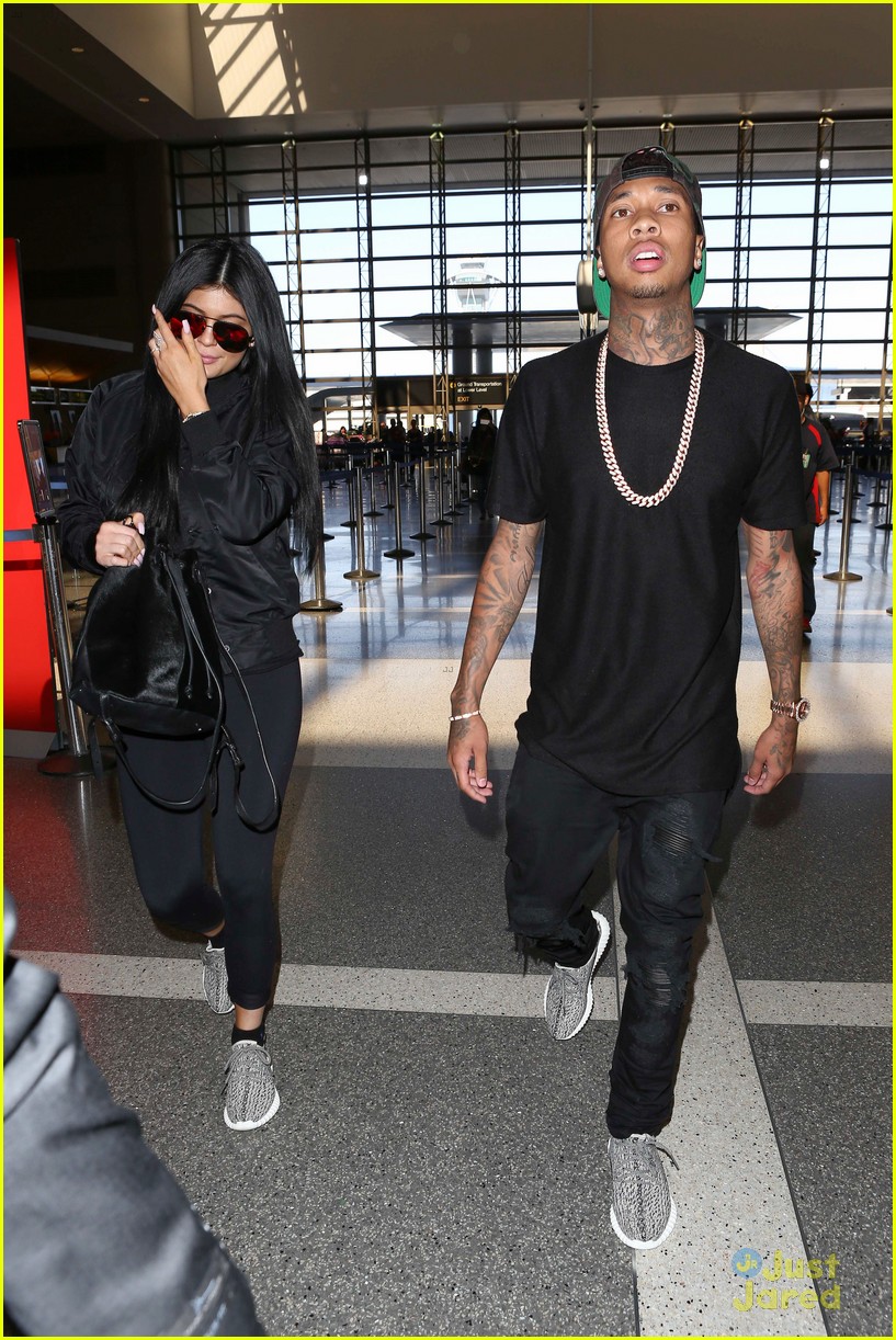 kylie jenner tyga coordinate outfits at lax airport 28