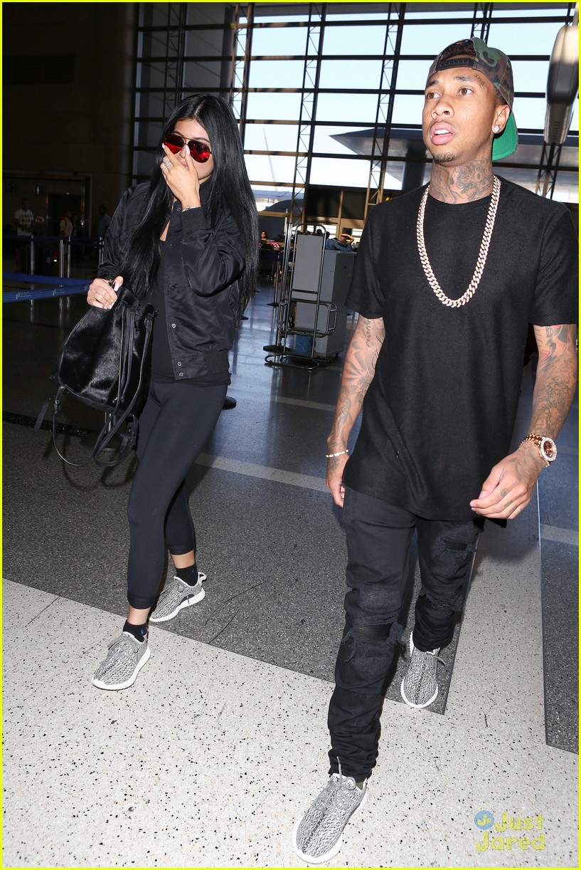 kylie jenner tyga coordinate outfits at lax airport 32